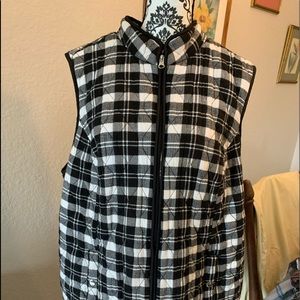 Black and white checked zippered vest.